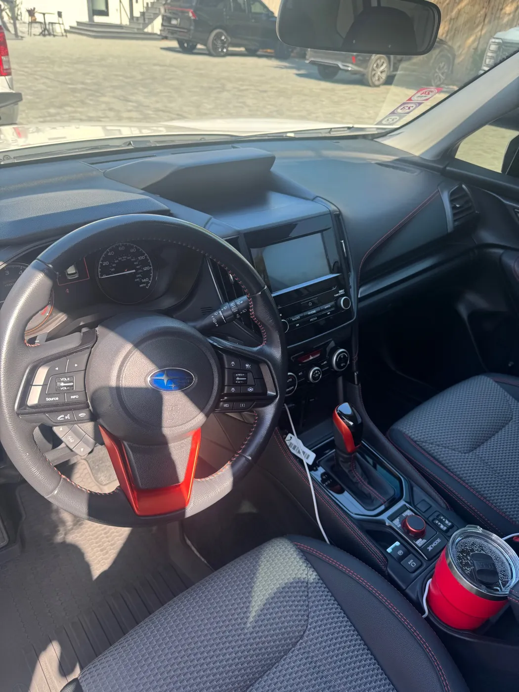 Subaru dash and front seats after an interior detail